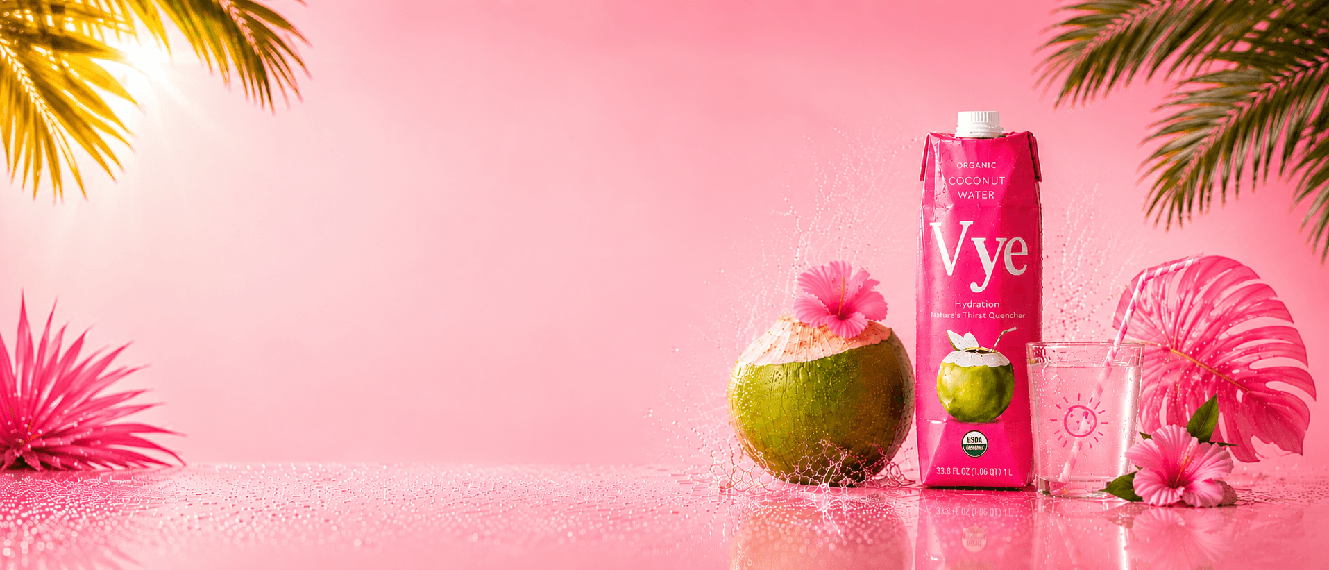 Vye coconut water with coconut and glass on a pink tropical background